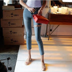 Trendy High-waisted Cropped Jeans With Raw Edges And Ripped Holes